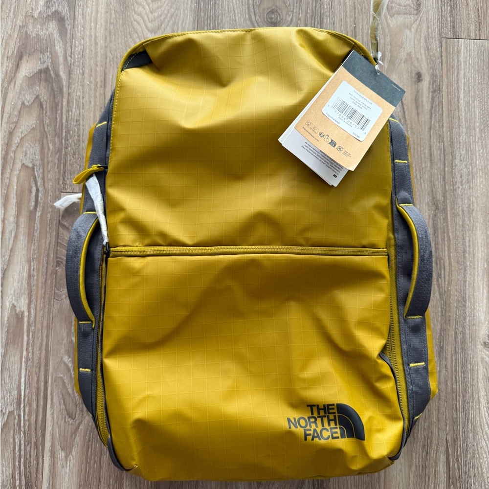 The North Face Men's Yellow Backpack with Gray Accents